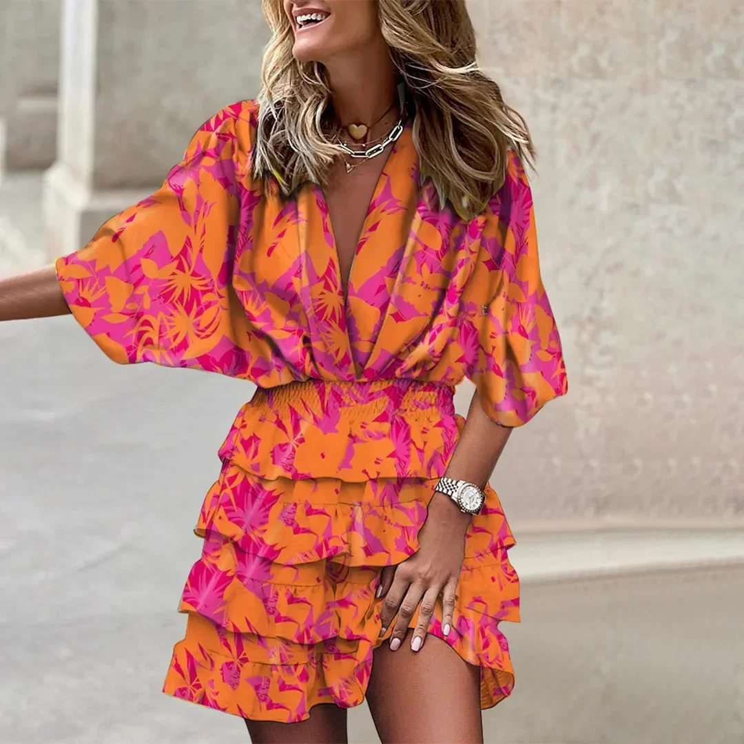 "Orange floral wrap dress with flared sleeves for women by Talani, featuring a beautiful printed design."