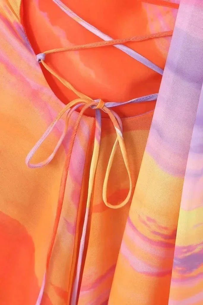 "Women's halter dress with multicolored swirl print, perfect for summer outings, made from lightweight and breathable…