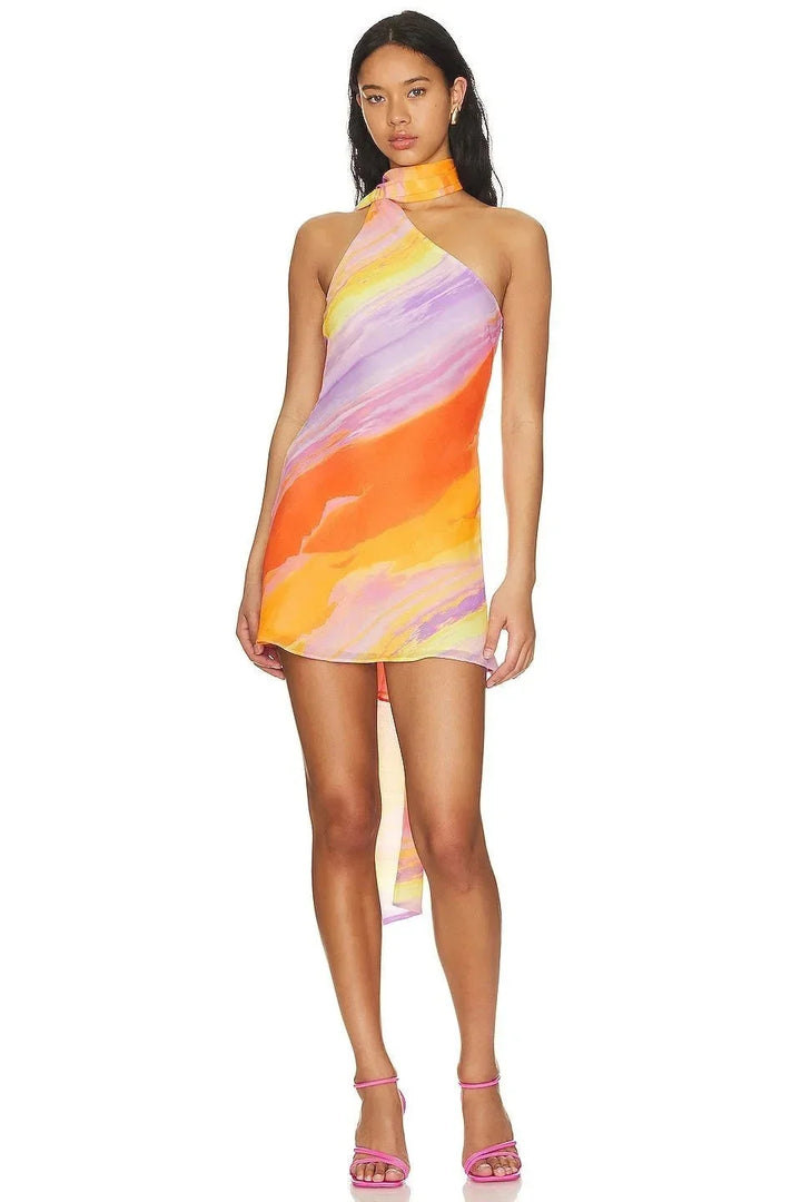 "Women's halter dress with multicolored swirl print, perfect for summer. Made from lightweight, breathable fabric."