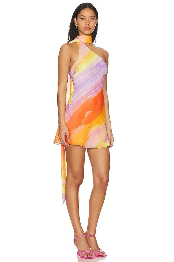 "Women’s halter dress with multicolored swirl print, perfect for summer. Made from lightweight and breathable fabric."