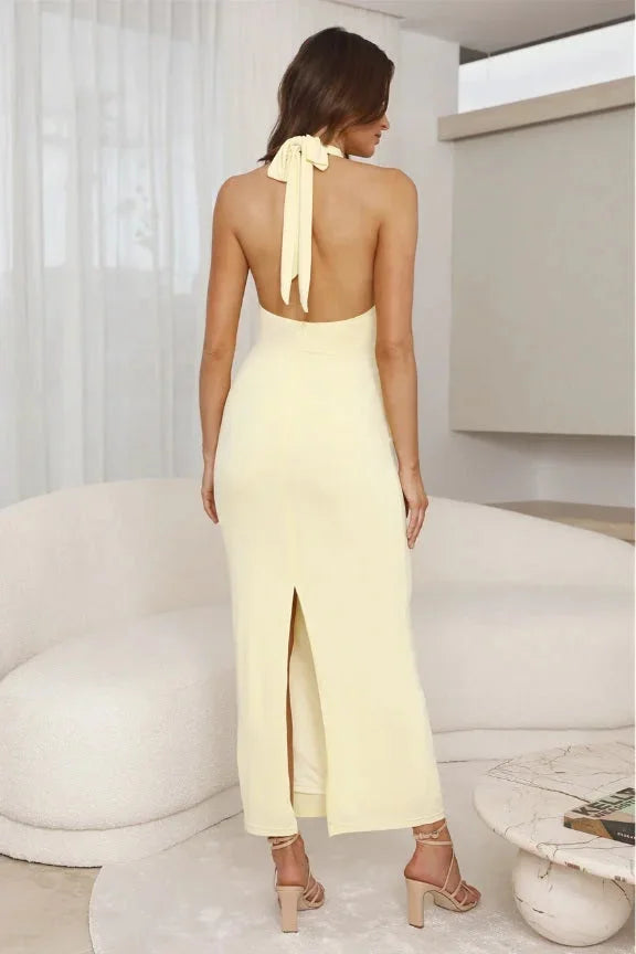 Yellow sleeveless maxi dress with a slimming silhouette, perfect for summer days. Made of breathable fabric with a…