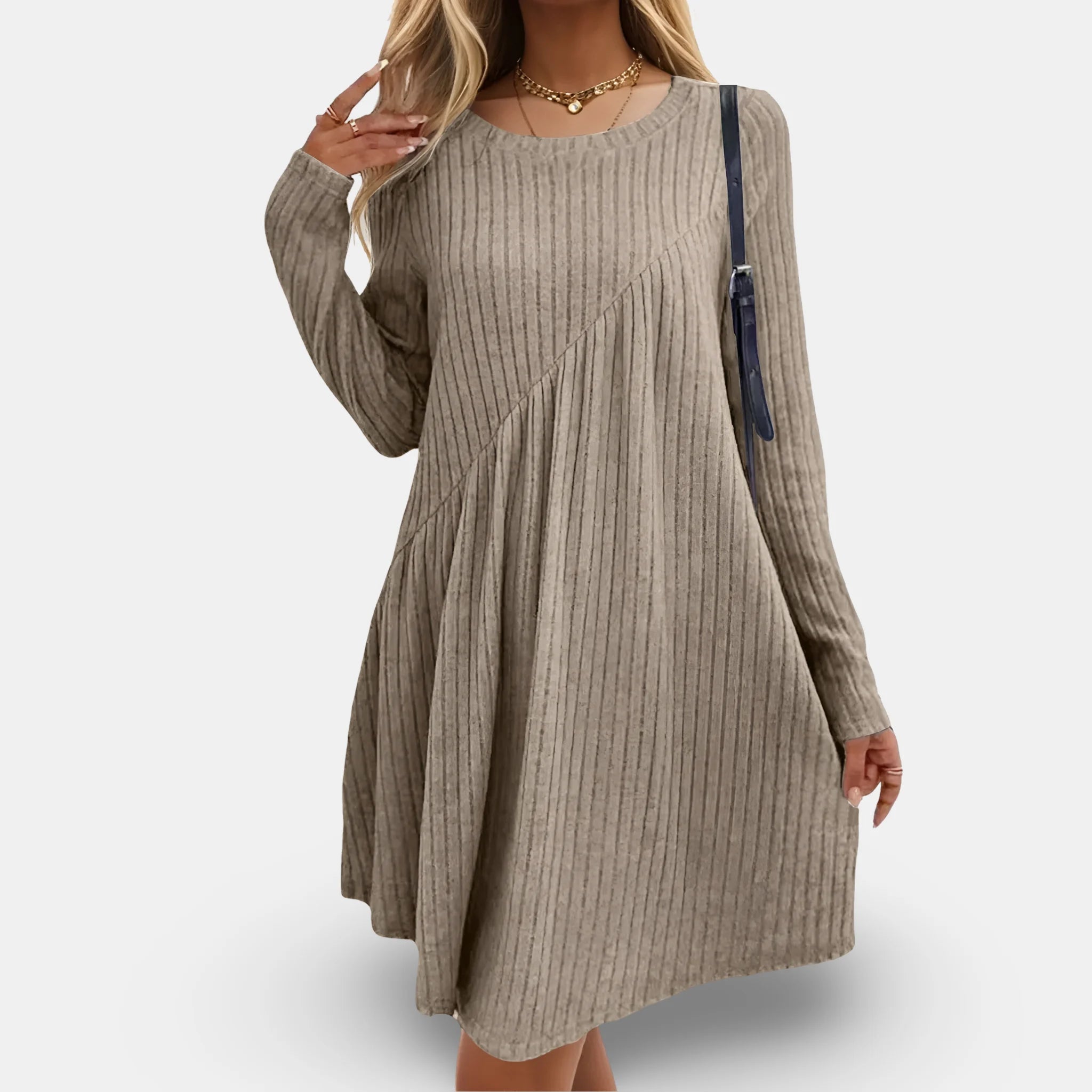 Flowing textured dress in black with long sleeves, perfect for chic casual looks.