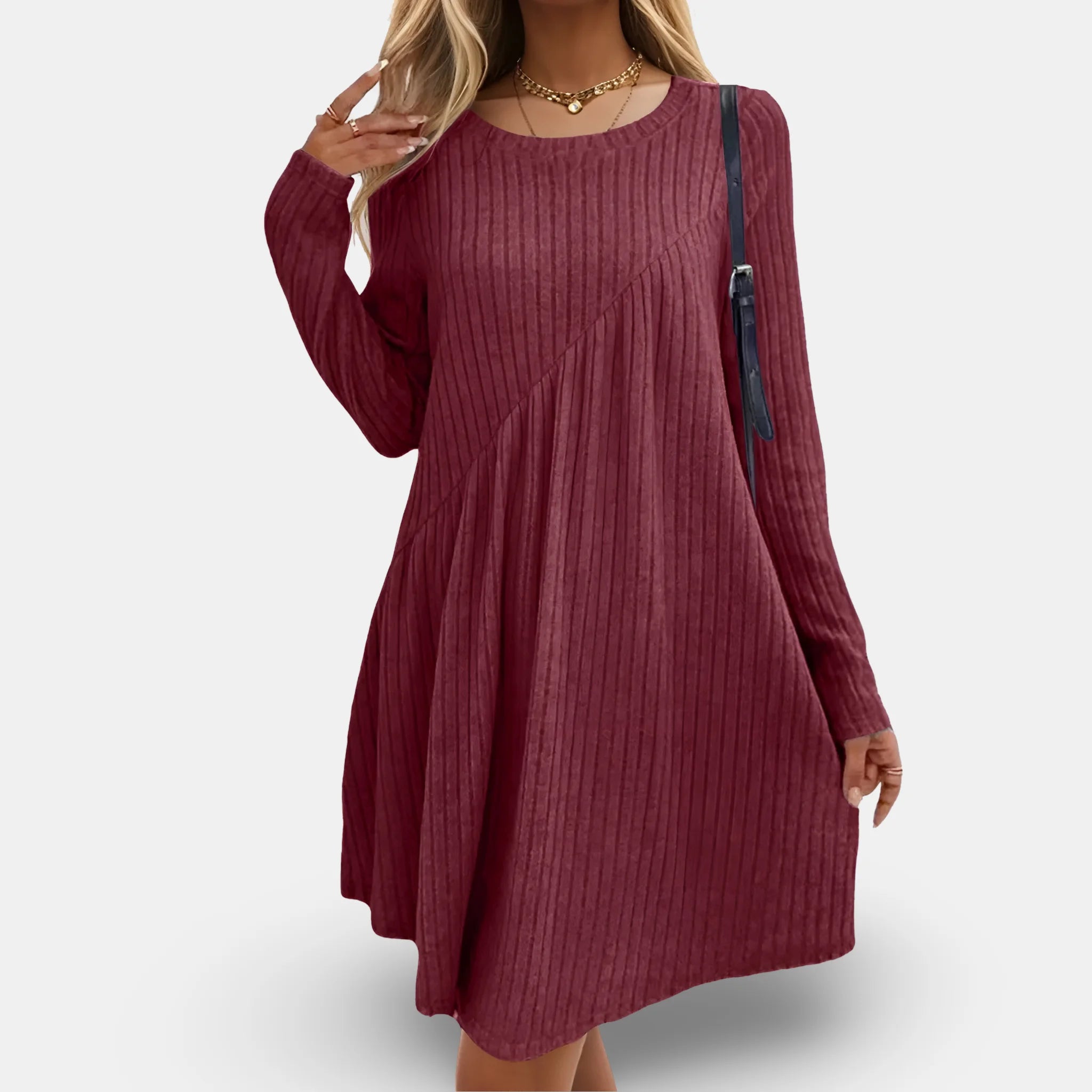 Red flowing textured dress with long sleeves, perfect for a chic and elegant look.