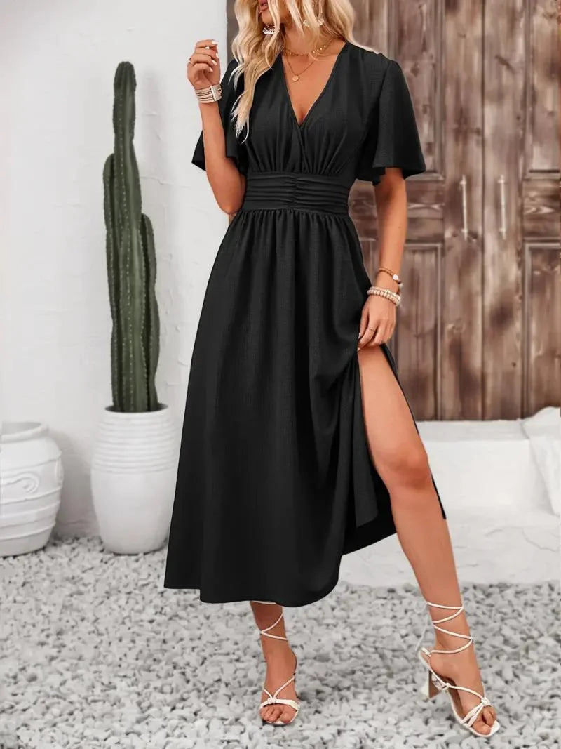 "Verity sundress: Flowy midi dress with V-neck, perfect for summer. Soft and breathable fabric in a flattering silhouette."