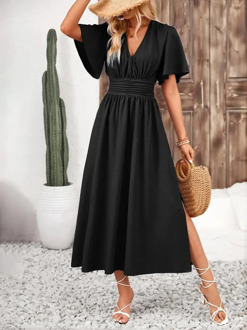 Flowy V-neck midi sundress in Verity design, perfect for casual summer wear, with a relaxed and comfortable fit.