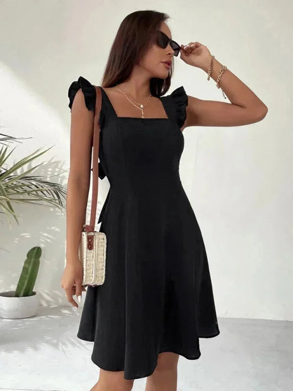 "Wilder women's fitted dress in soft cotton, featuring ruffle straps for a feminine touch, ideal for casual or semi-formal…