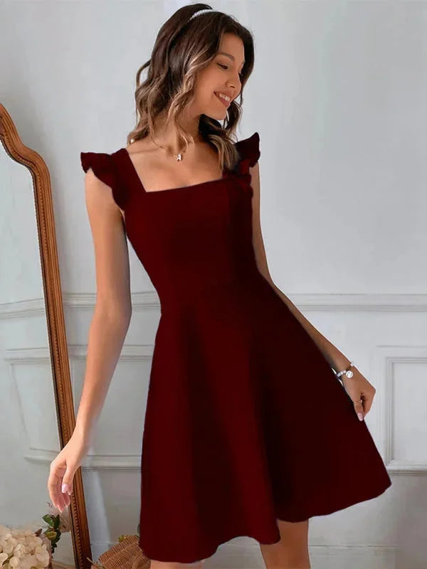 "Wilder women's fitted dress with ruffle straps in soft organic cotton, perfect for a casual yet stylish look."