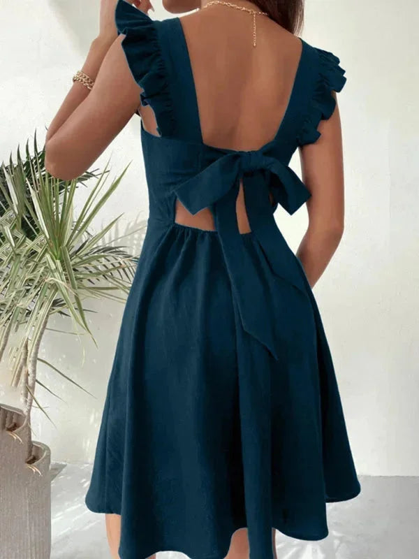 "Wilder fitted dress for women with ruffle straps in soft cotton blend fabric, perfect for a chic and comfortable look."