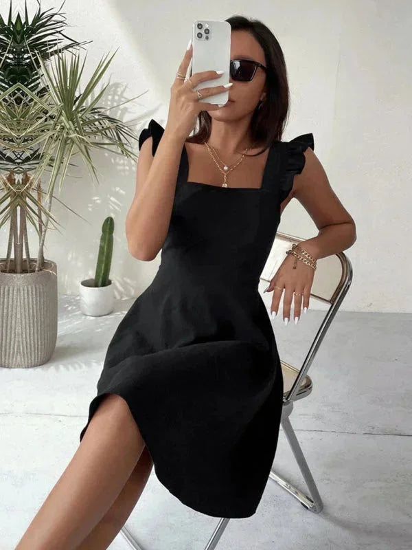 Close-fitting midi dress for women featuring charming ruffle straps, made of soft, breathable cotton blend fabric in a…