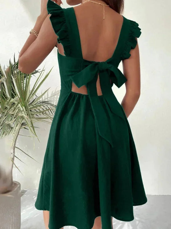 Women's fitted dress made of breathable cotton blend, featuring elegant ruffle straps and a flattering silhouette.
