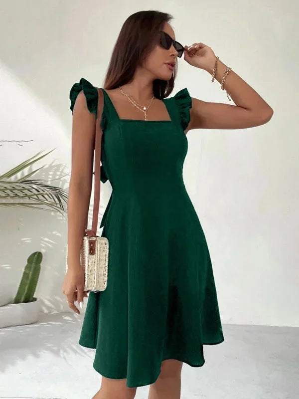 "Wilder fitted dress for women, featuring ruffle straps and made from soft, breathable fabric in a flattering, feminine…