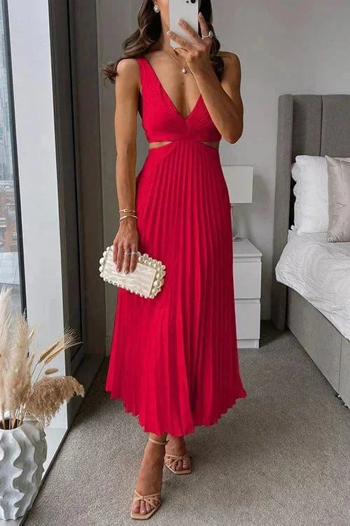 Red pleated dress with side cut-outs for women, elegantly designed. Made from high-quality fabric, ideal for special…