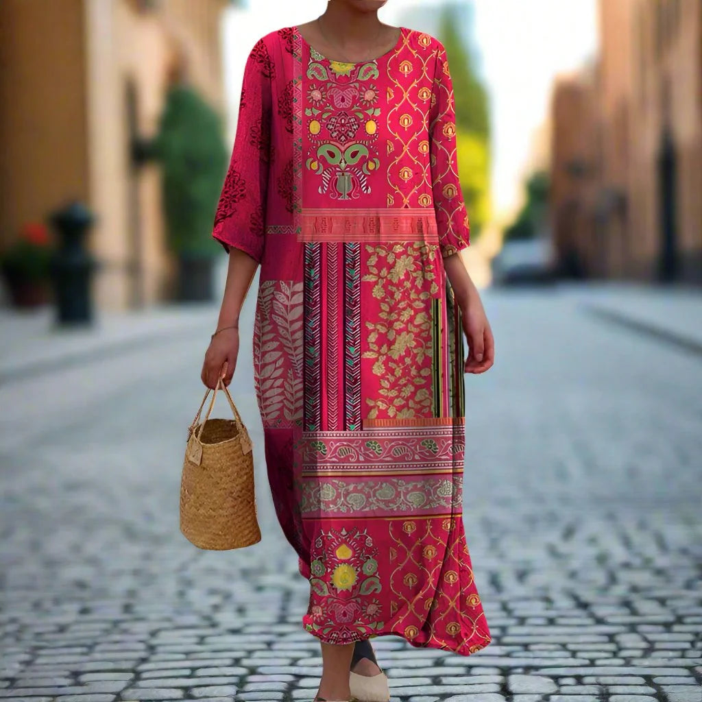 "Zionna maxi dress in vibrant pink with tribal print, floor-length design, and made from soft, breathable fabric for a…