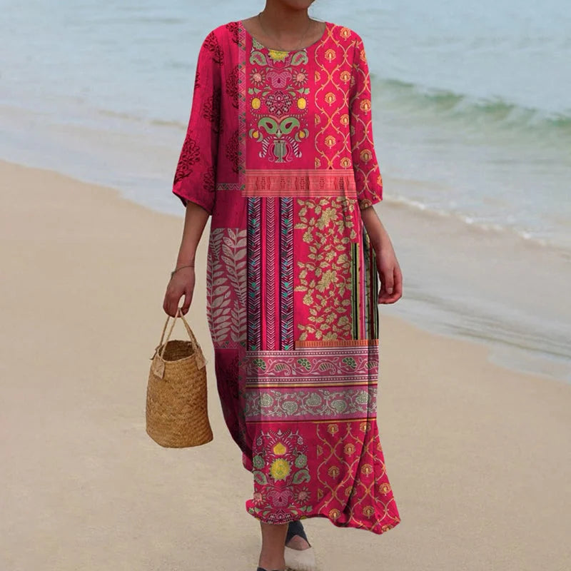 Pink tribal print maxi dress with vibrant hues. Features a flowy silhouette with intricate tribal pattern. Perfect for…