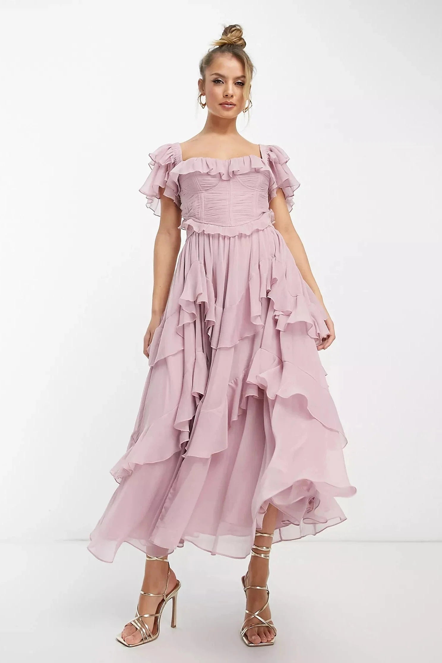 "Zyanya Pink tiered ruffle maxi dress, featuring a flowy design with ruffle details, perfect for a chic and feminine look."